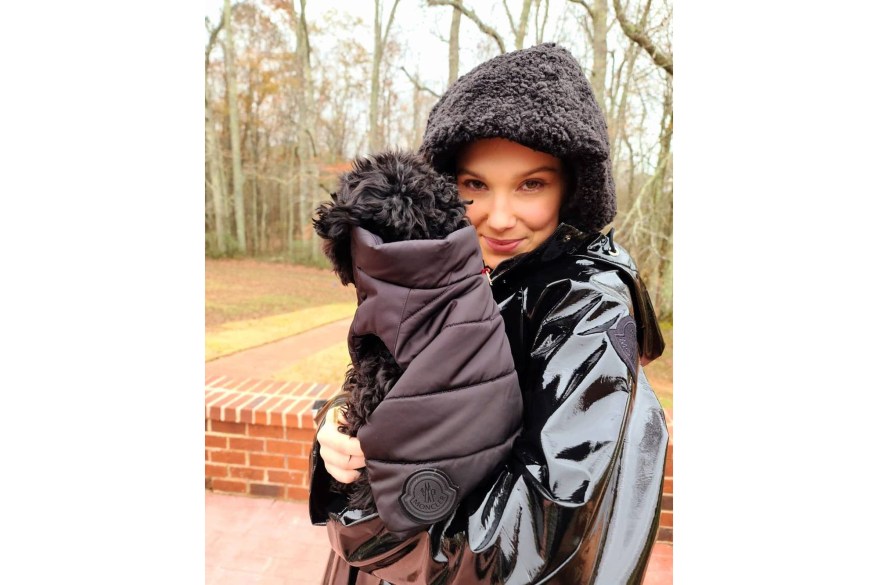 Millie Bobby Brown and her dog Luna match in Moncler jackets.