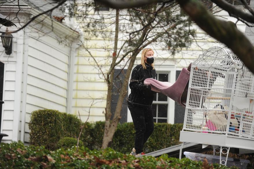 Sandra Lee packing her belongings into a moving van.