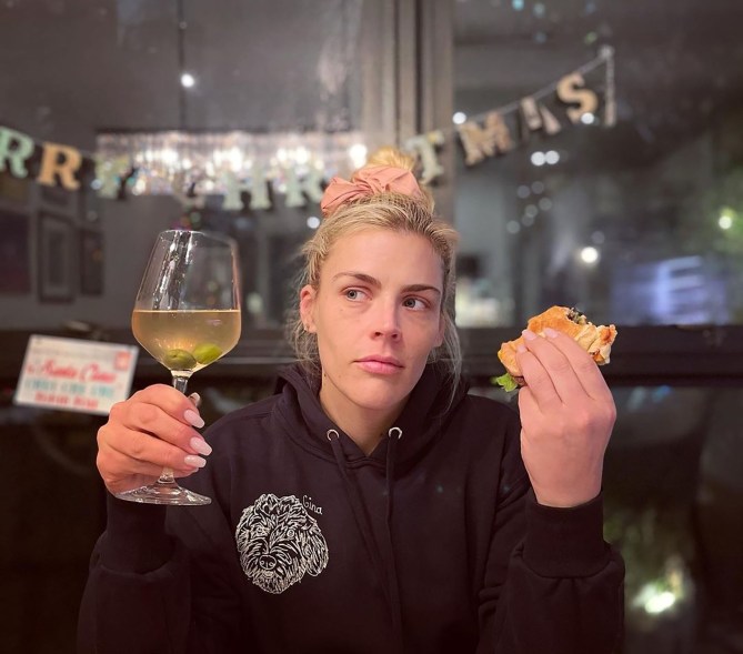 “On the Sunday night before Xmas, everyone knows that the customary meal is a cheeseburger and a dirty martini in a wine glass, extra olives,” writes Busy Philipps on Instagram.