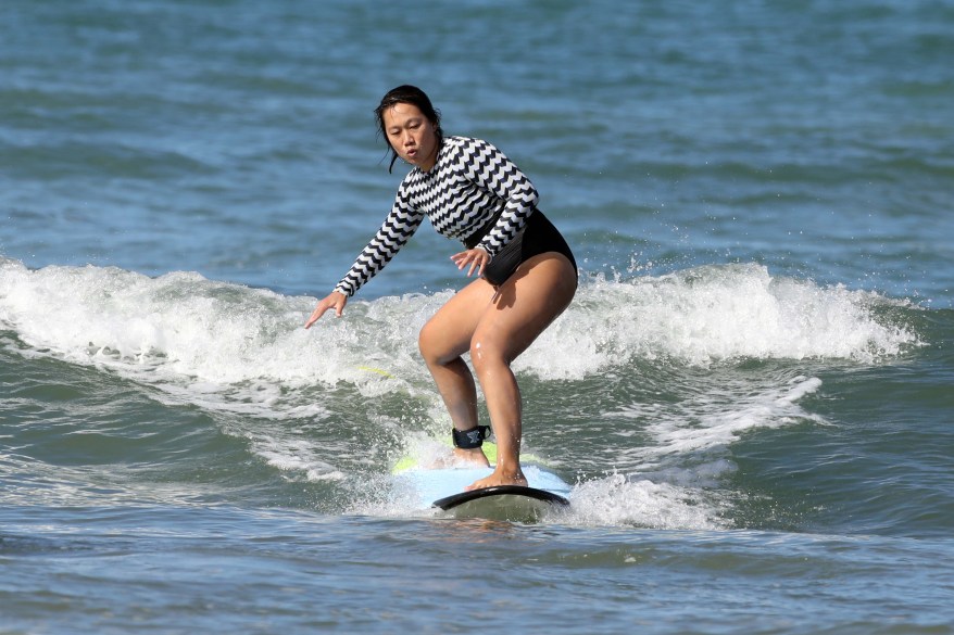 Mark Zuckerberg's wife Priscilla Chan hits the waves in Hawaii.