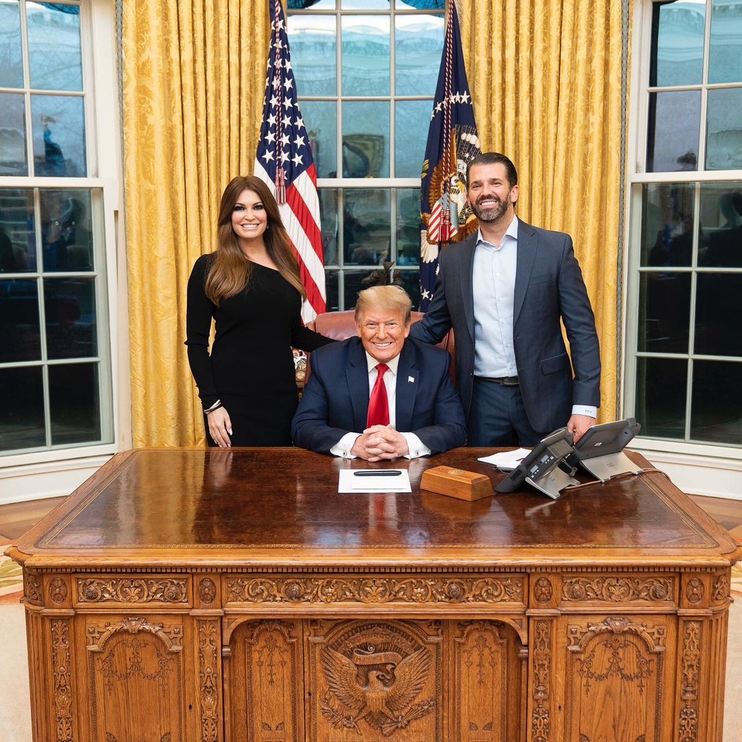 Kimberly Guilfoyle with Donald Trump and Donald Trump Jr. in the White House.