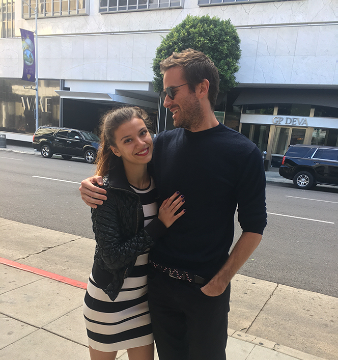 Effie and Armie Hammer pose together in LA during their relationship.