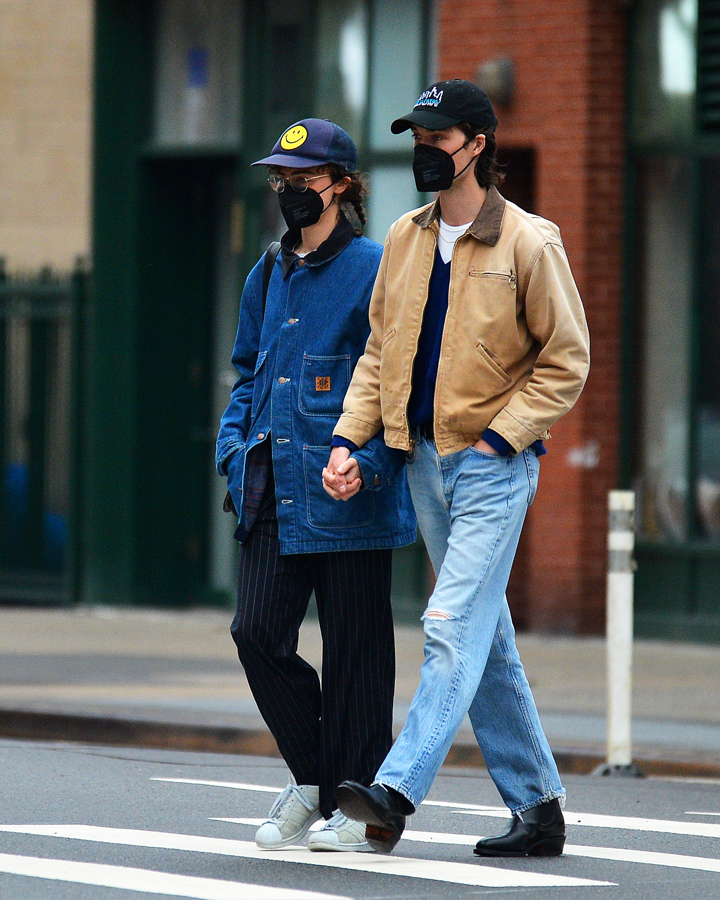 Ella Emhoff and Samuel Hine both took precautions in black face masks.