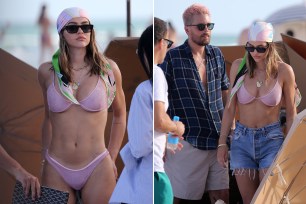 Amelia Hamlin and Scott Disick hit the beach.