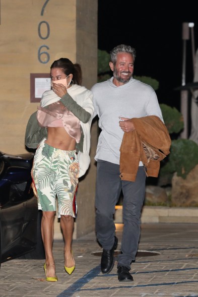 Brooke Burke shows off her rock hard abs as she and Scott Rigsby hit Nobu in Malibu.