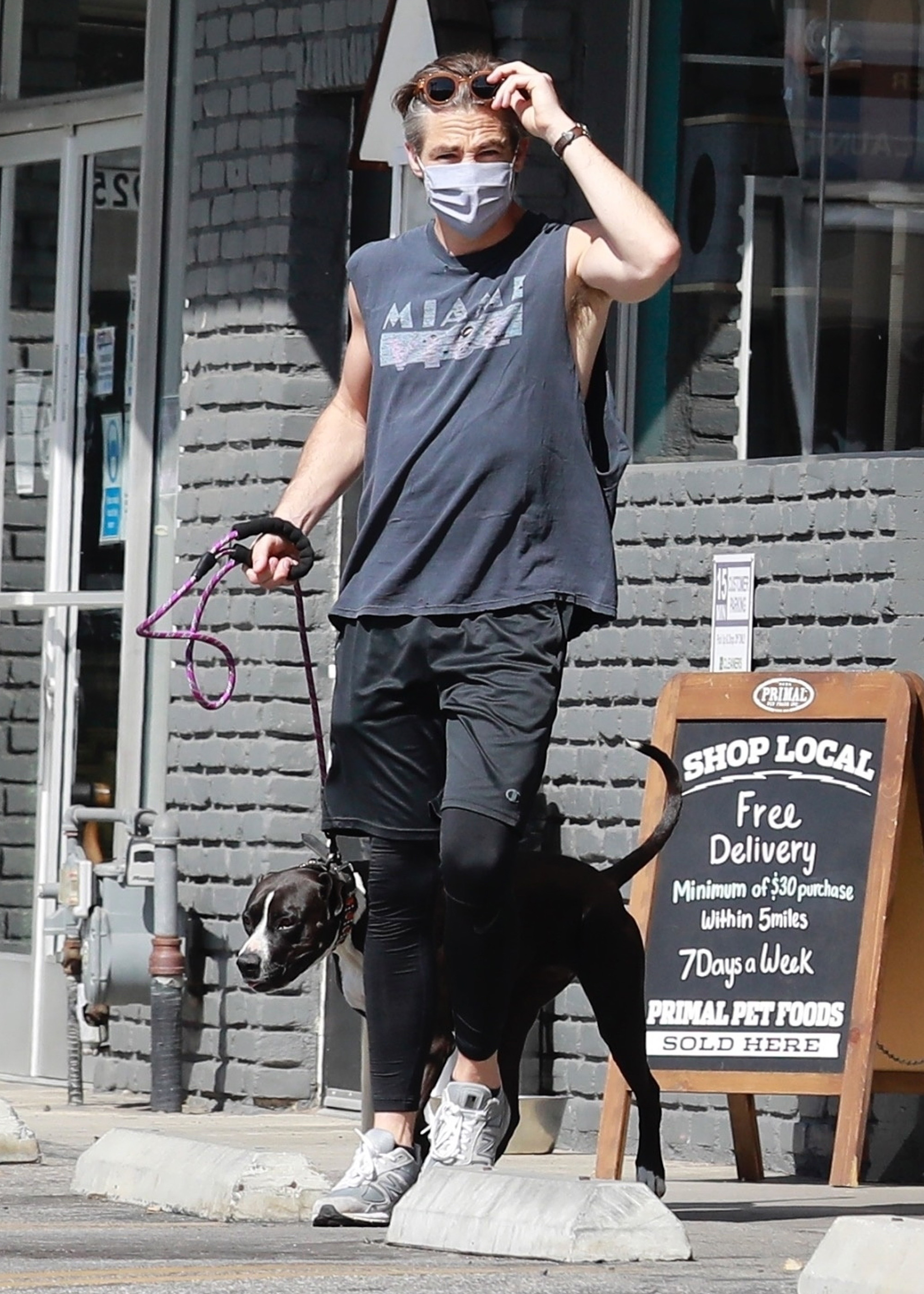 Earlier in the day Chris Pine was seen running errands with his dog, this time wearing a shirt. 