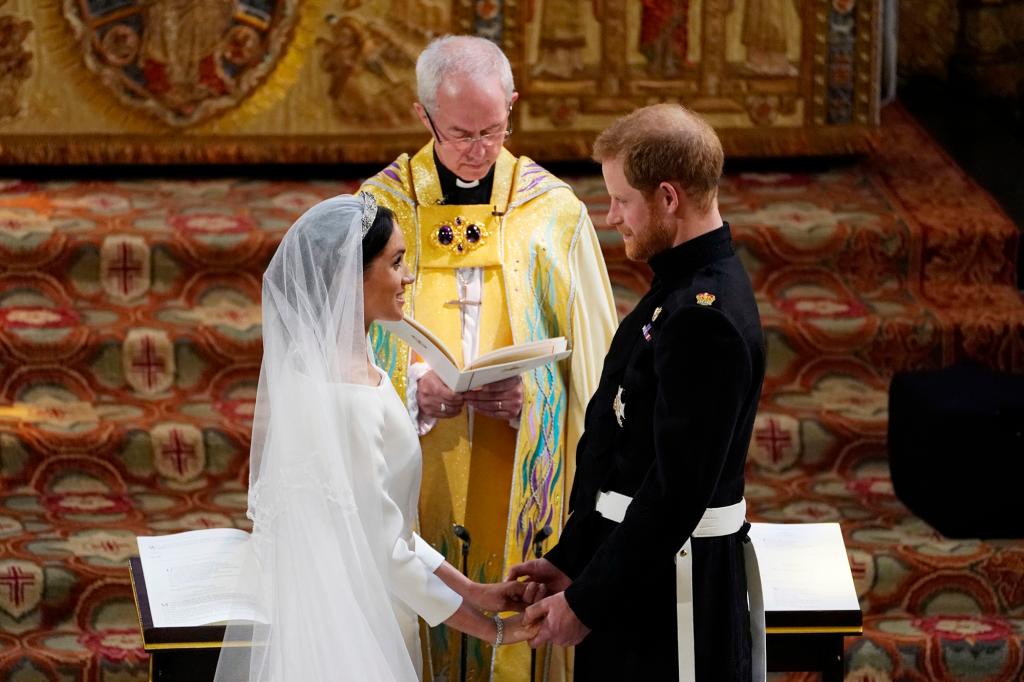 Prince Harry and Meghan Markle stand before Archbishop of Canterbury Justin Welby during their wedding ceremony.