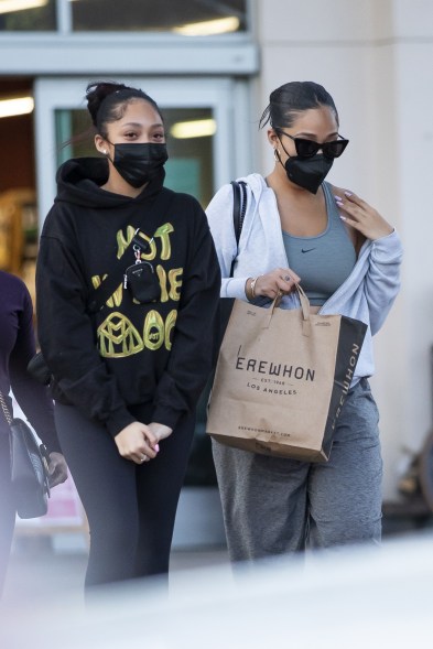 Jordyn Woods grabs dinner from Erewhon Organic with her younger sister Jodie in Calabasas.