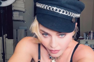 Madonna poses in lingerie for a series of sexy Instagram selfies.