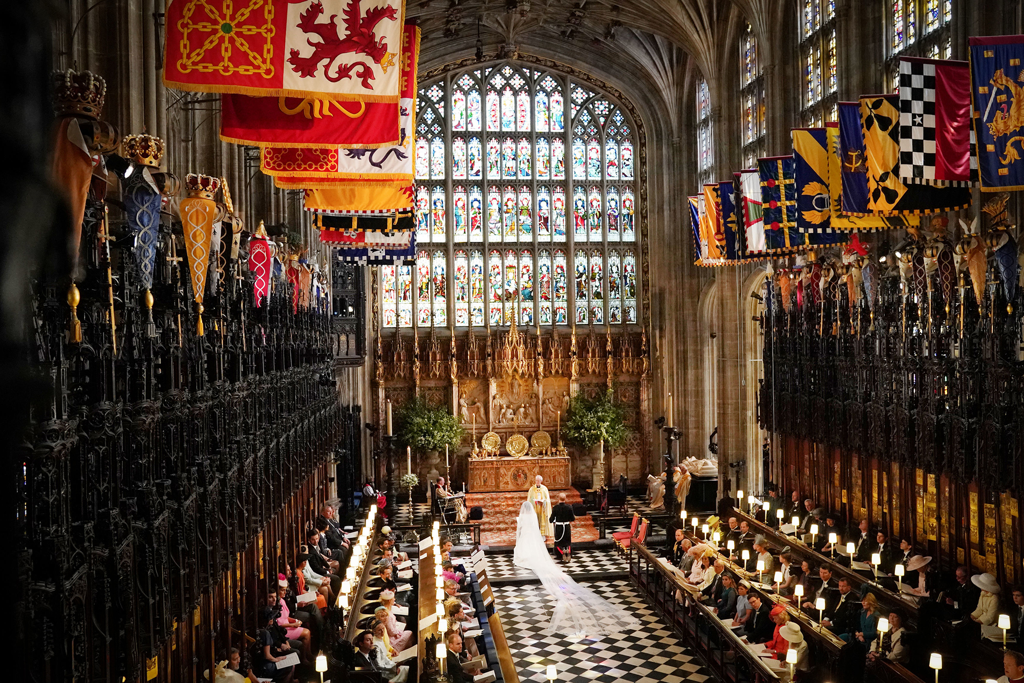 Prince Harry and Meghan Markle exchange vows during their wedding ceremony in St George's Chapel at Windsor Castle on May 19, 2018 in Windsor, England.