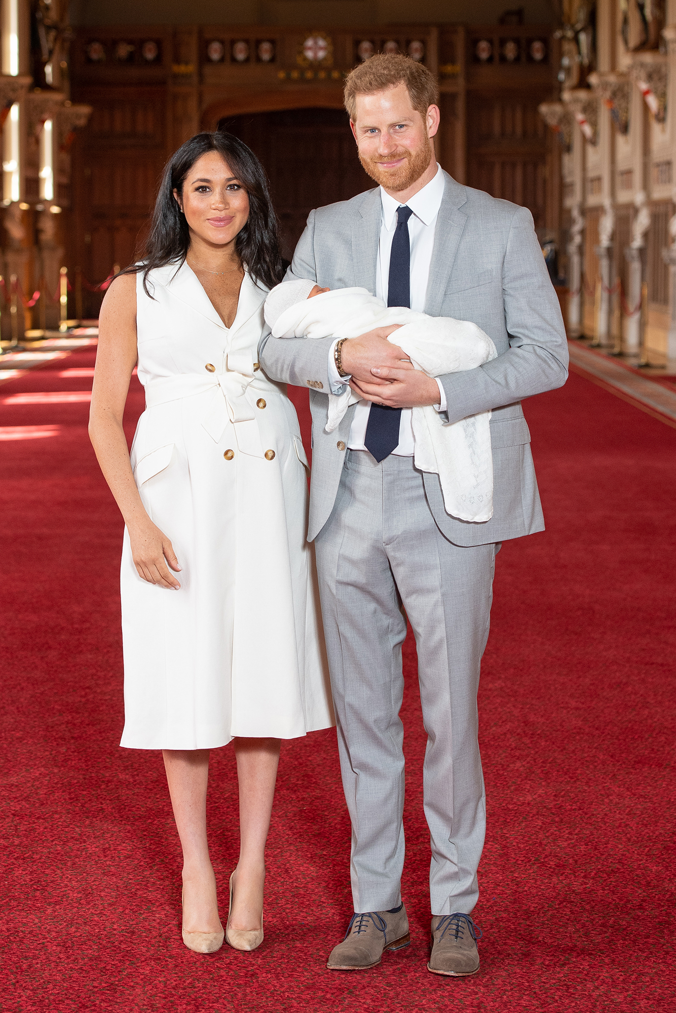 Prince Harry (in J.Crew) with Meghan Markle and son Archie Harrison Mountbatten-Windsor during a photocall on May 8, 2019.