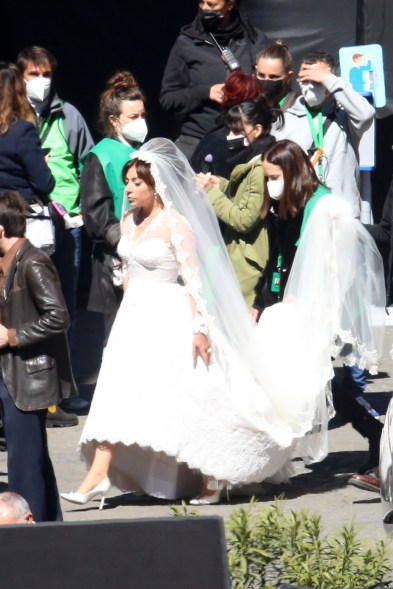 Lady Gaga wears a wedding dress while filming "House of Gucci" in Rome, Italy.