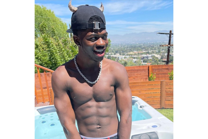 After dropping a hell-themed music video for his song “Montero,” Lil Nas X rocks a baseball hat adorned with devil horns.