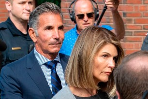 Actress Lori Loughlin and husband Mossimo Giannulli exit the Boston Federal Courthouse after a pre-trial hearing on August 27, 2019