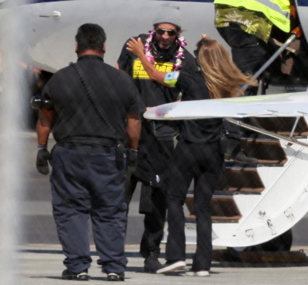 Green Bay Packers quarterback Aaron Rodgers arrives in Hawaii.