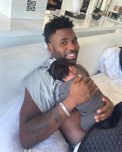 Jason Derulo snuggles up close to his son, Jason King Derulo.