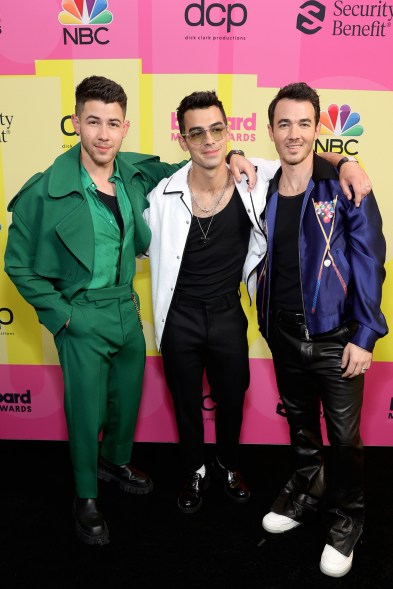 Nick, Joe and Kevin Jonas on the Billboard Music Awards 2021 red carpet