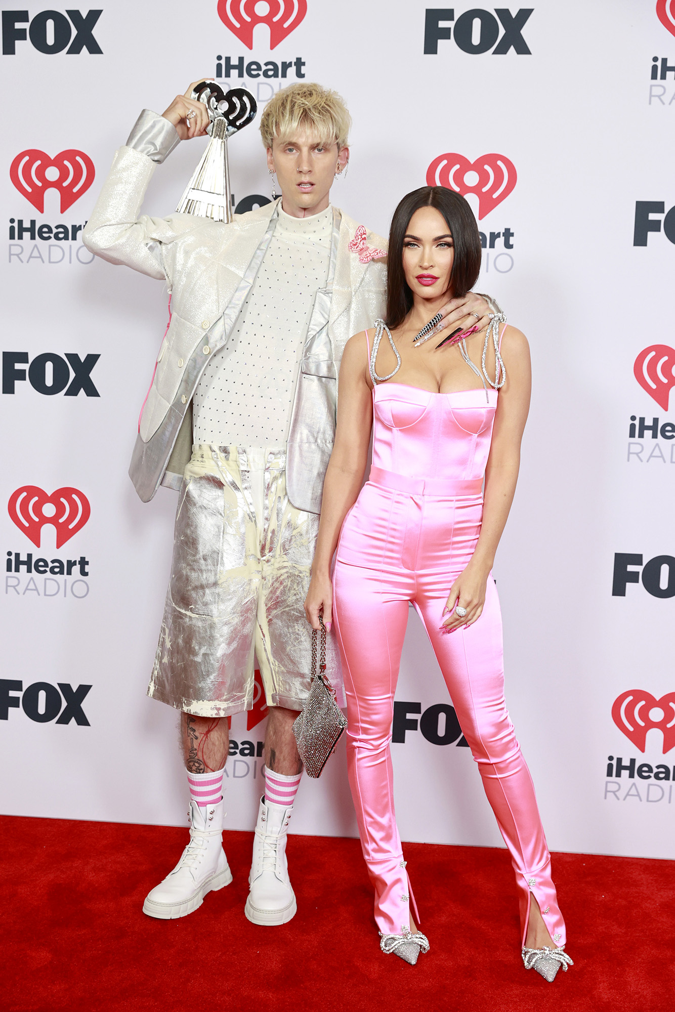 Machine Gun Kelly and Megan Fox on the iHeartRadio Music Awards 2021 red carpet