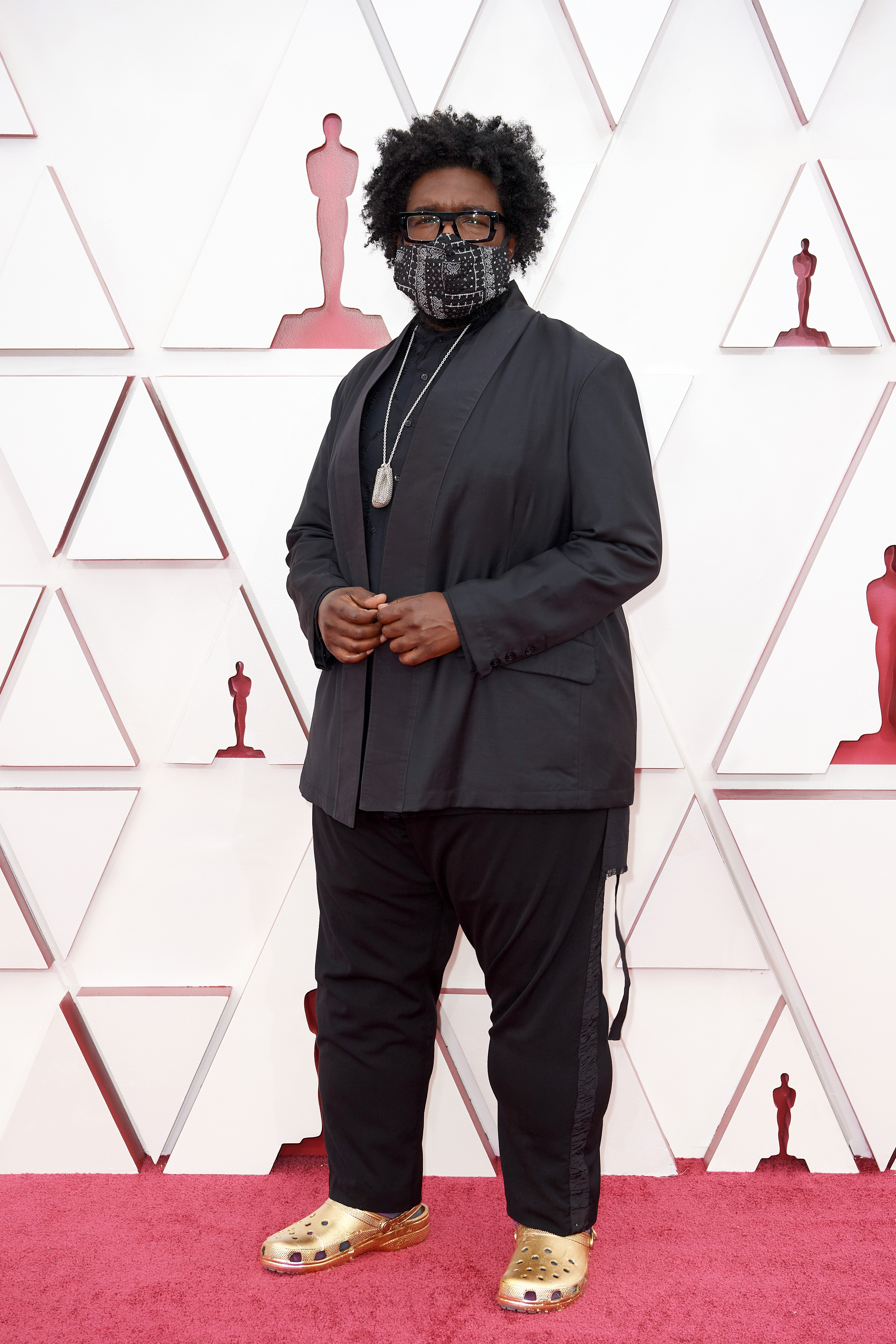 Questlove hit the 2021 Oscars red carpet in a pair of gold Crocs.
