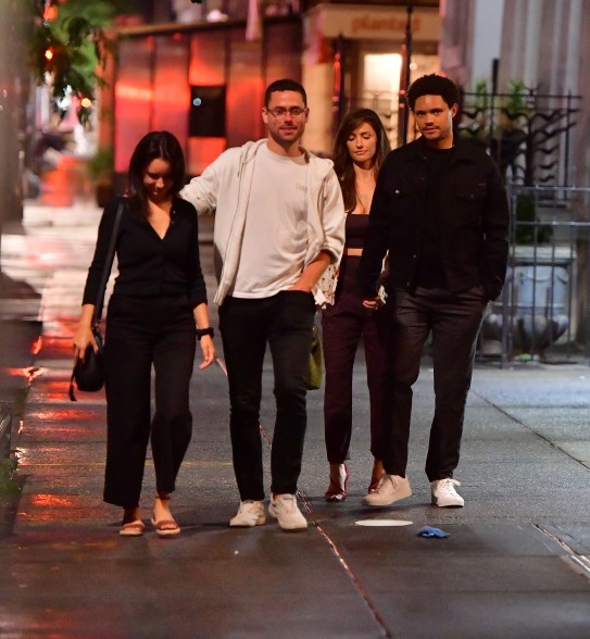 Trevor Noah and Minka Kelly head out with friends.