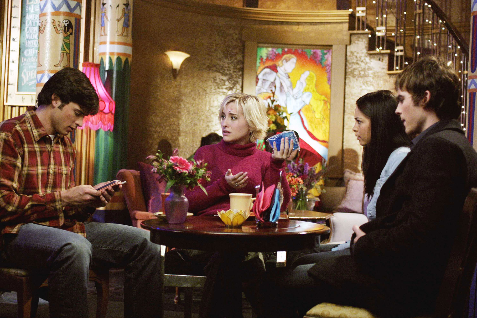Tom Welling, Allison Mack, Kristin Kreuk and Ian Somerhalde in an episode of "Smallville."