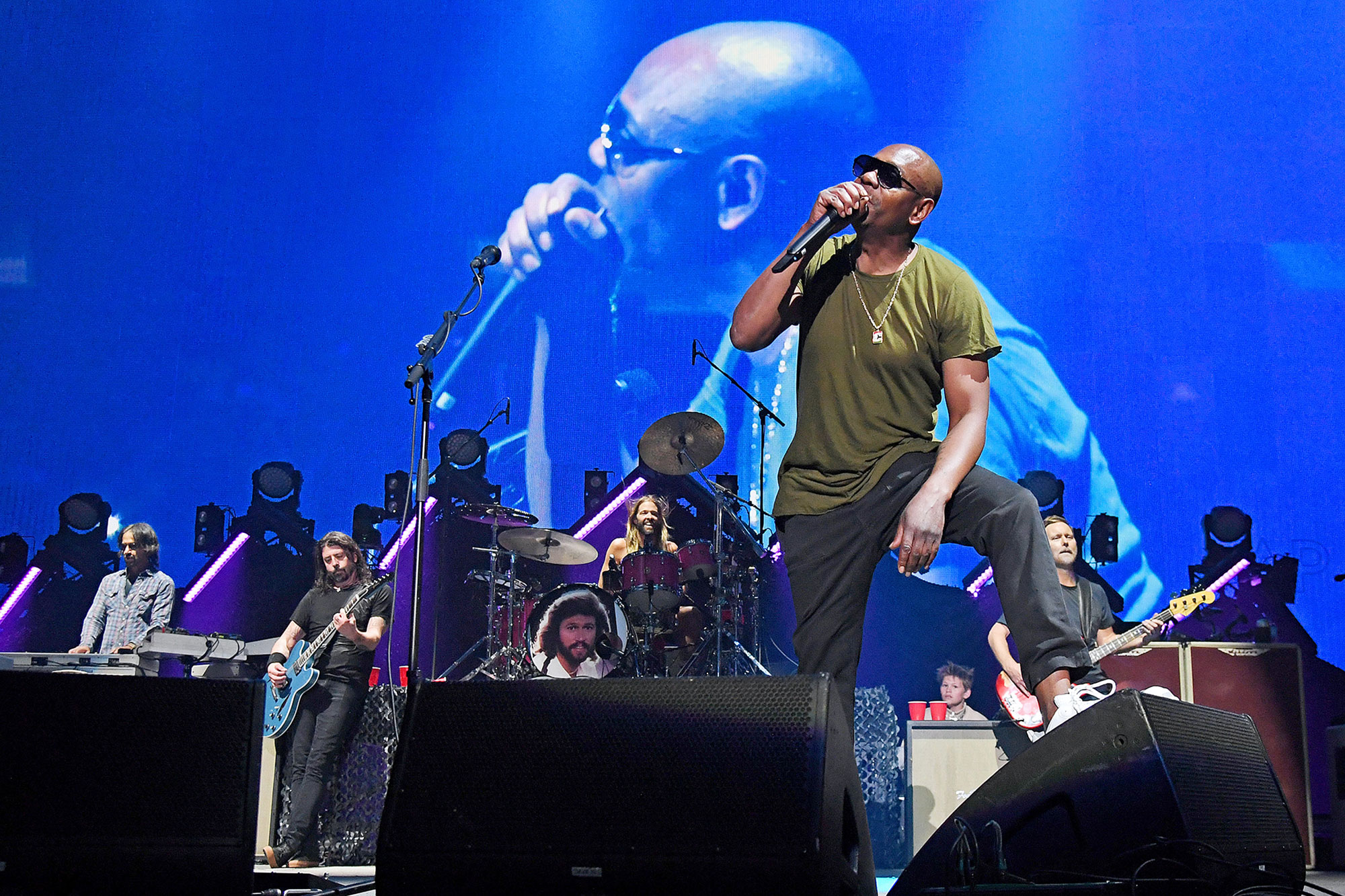 Dave Chappelle onstage with the Foo Fighters at Madison Square Garden.