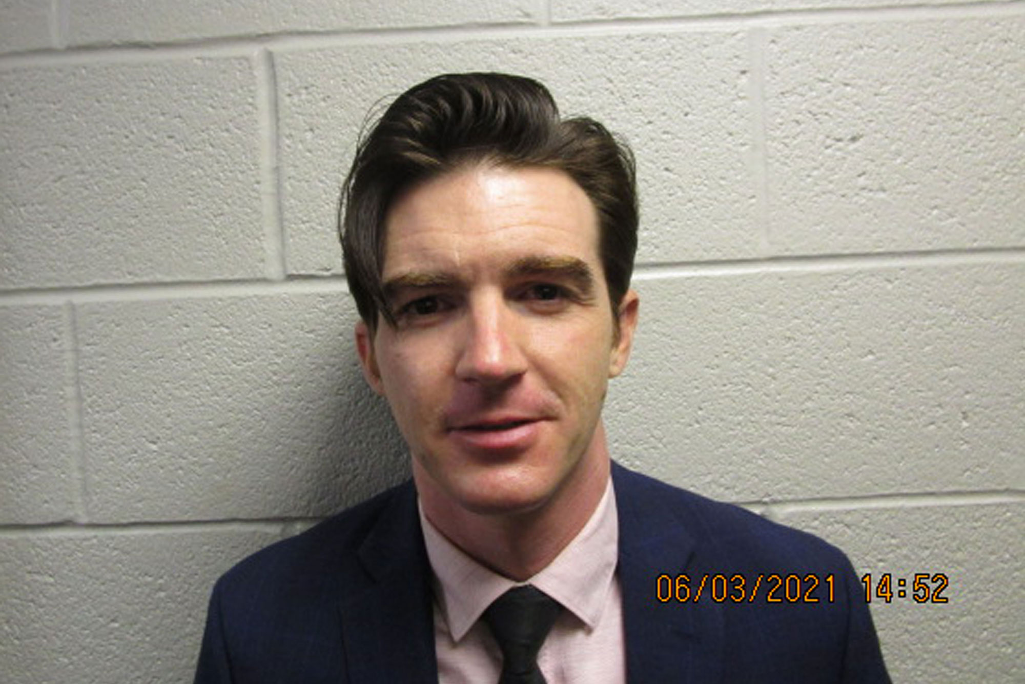 Drake Bell's mugshot.