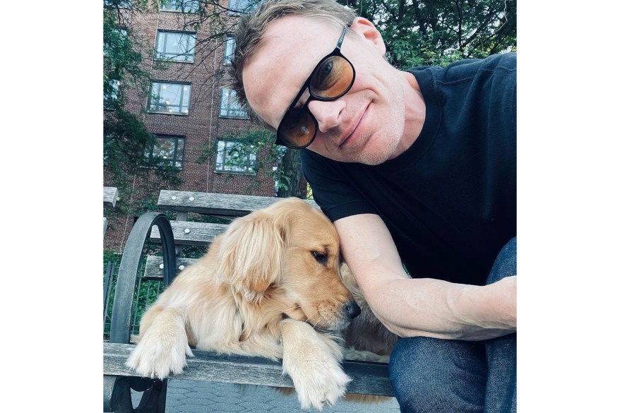 LOUNGE AROUND: In New York City, “WandaVision” actor Paul Bettany takes a rest while walking his pooch, Wallis.