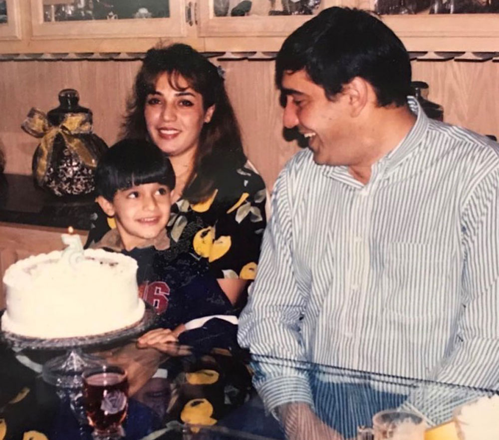 Asghari shared this throwback pic with his parents in 2020. 