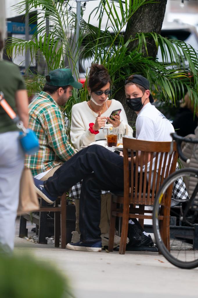 Bella Hadid, Marc Kalman and a friend