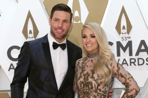 Carrie Underwood and Mike Fisher in 2019