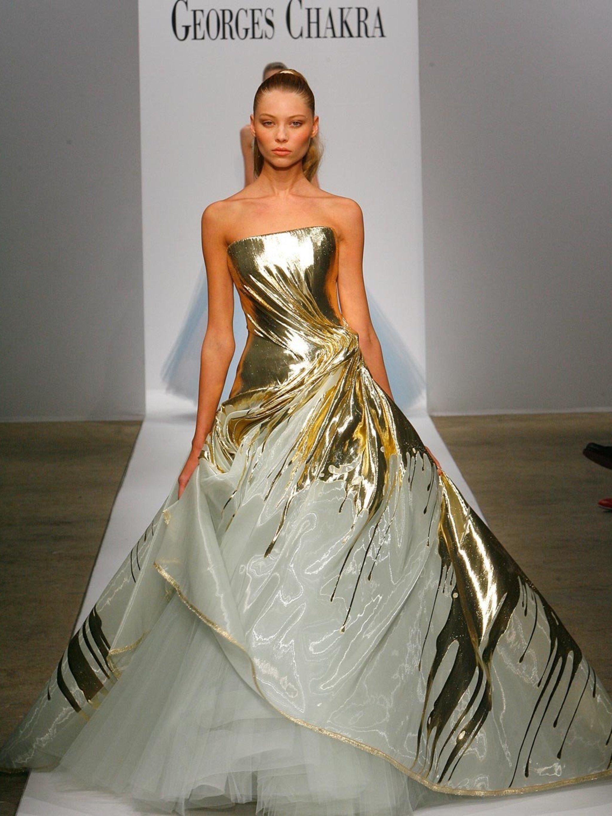 A closer look at Serena's gold Georges Chakra Couture wedding dress, as seen on the brand's Spring 2011 runway.