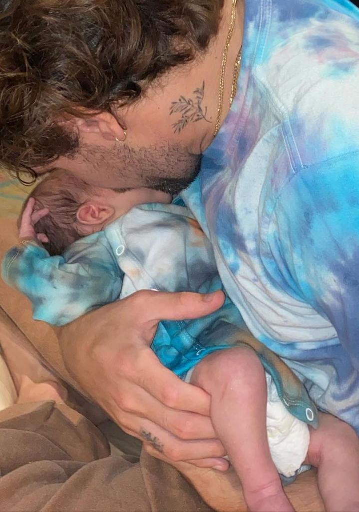 Halsey shared a photo of baby Ender and father Alev Aydin matching in blue tie-dye.