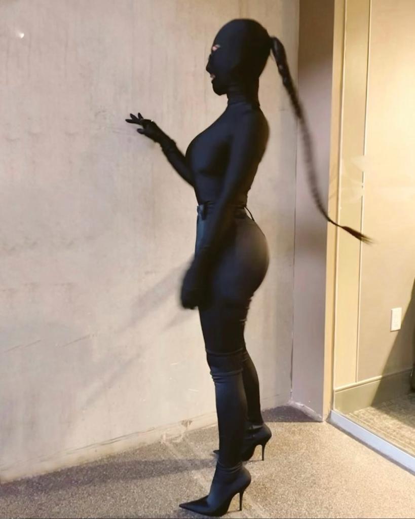 Kim Kardashian wore a skintight black Balenciaga getup to Kanye West's second "Donda" event.