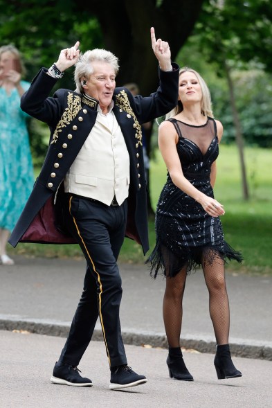 ROCK ’N’ STROLL Rod Stewart takes a walk on the wild side while filming a music video in London.