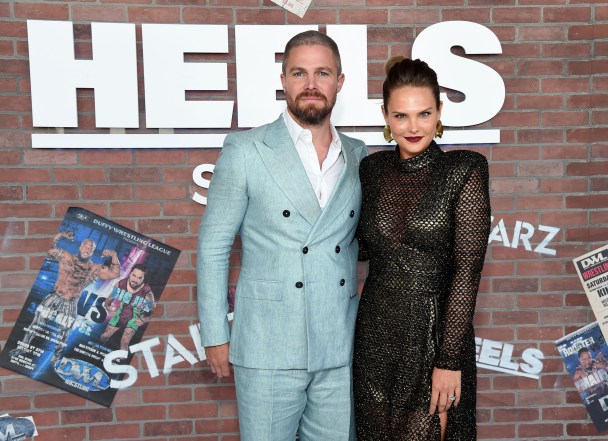 Stephen Amell and his wife, Cassandra Jean Amell, attend the red carpet premiere of "Heels" together.