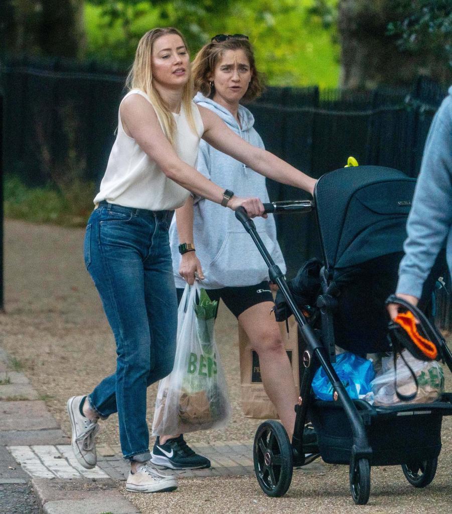 Amber Heard snapped taking her daughter for a walk in North London.