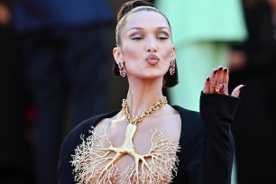 Bella Hadid makes a kissy-face at the 2021 Cannes Film Festival.