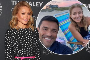 Kelly Ripa with a selfie of her and Mark Consuelos