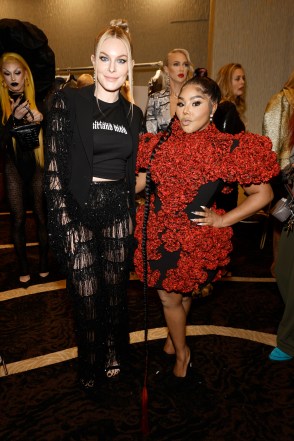 Leah McSweeney and Lil' Kim pose backstage at Christian Siriano's fashion show.