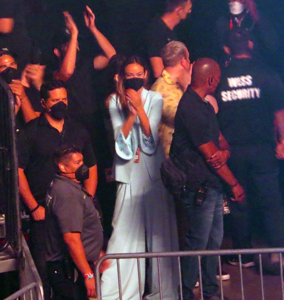 Olivia Wilde claps during Harry Styles' concert in Las Vegas.