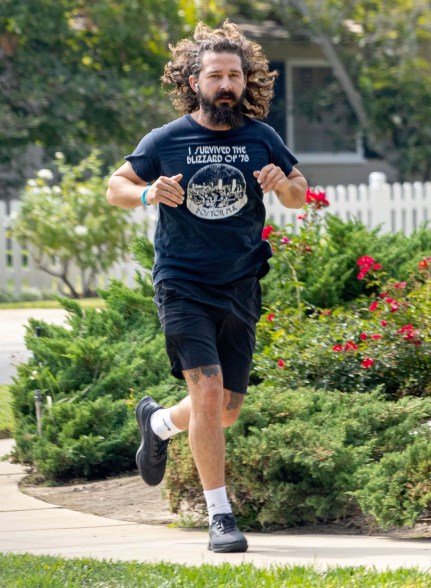 Long-haired Shia LaBeouf jogs