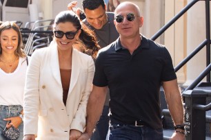 Jeff Bezos and girlfriend Lauren Sanchez walking hand in hand in New York.