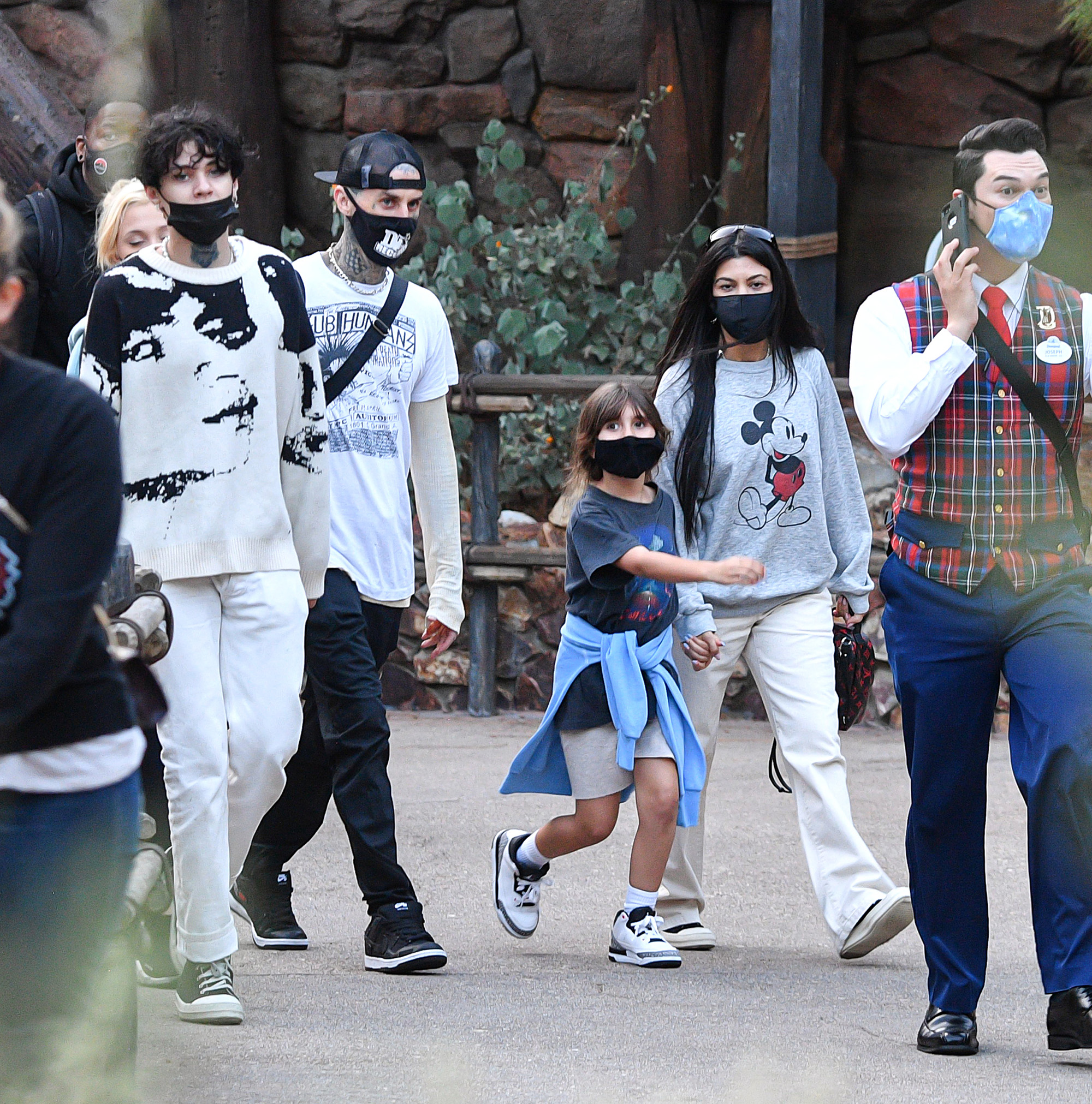 Kourtney Kardashian and Travis Barker with their kids.