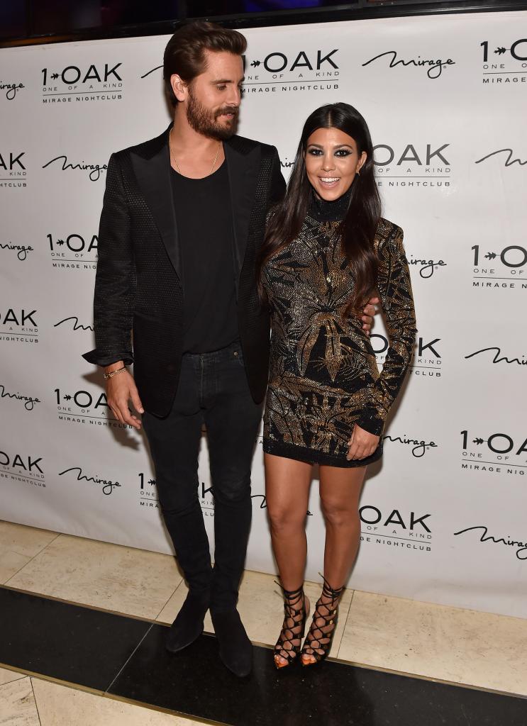 Scott Disick and Kourtney Kardashian pose on the red carpet in 2015