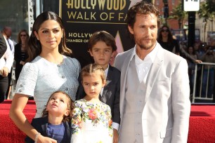 Matthew McConaughey and his wife Camila Alves with their children Levi, Livingston, and Vida.