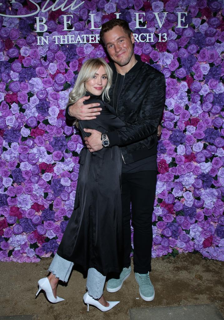 Cassie Randolph hugging Colton Underwood at a red carpet event in March 2020
