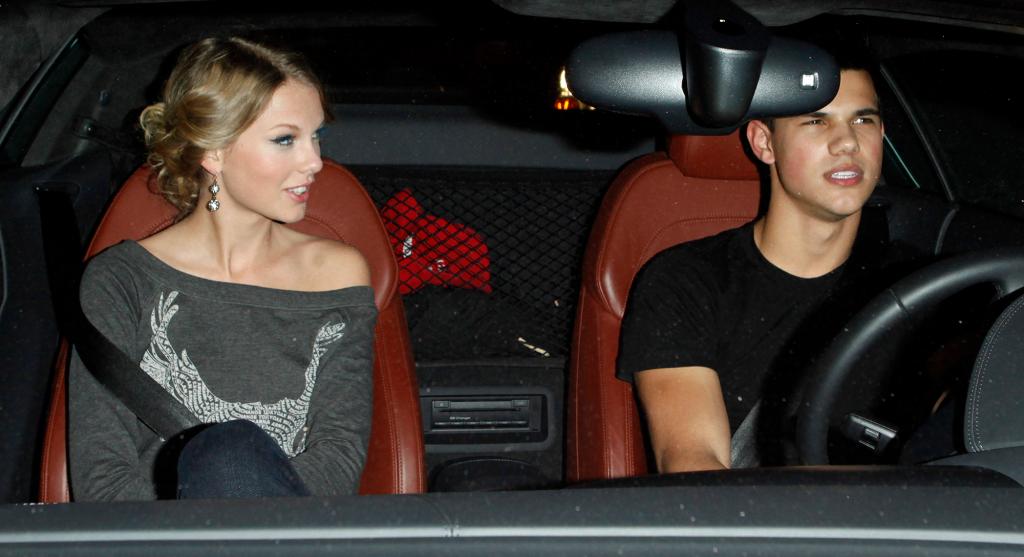 Taylor Swift and Taylor Lautner driving. 