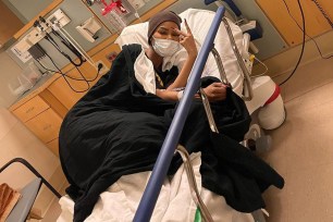 Teyana Taylor in a hospital bed.