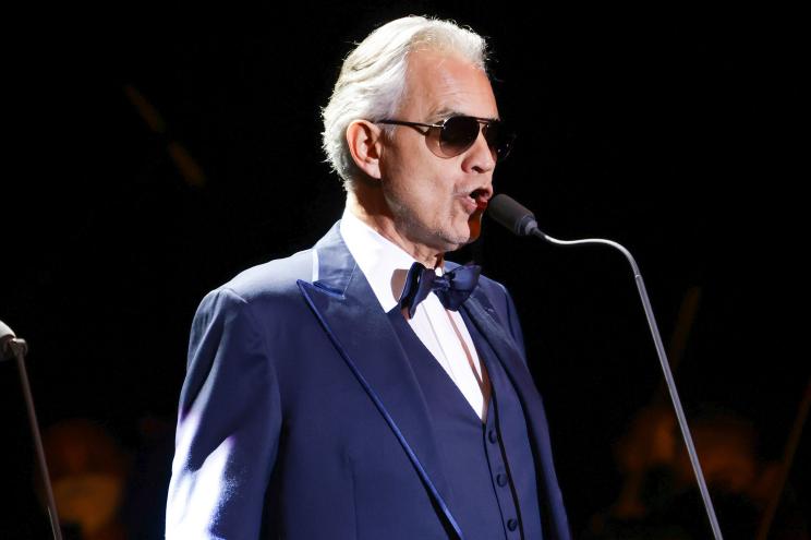 Andrea Bocelli performs in a tuxedo.